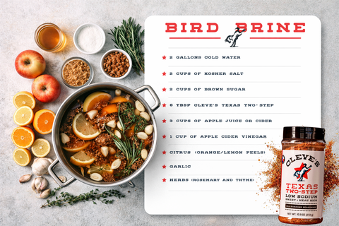 Stockpot of Cleve's Bird Brine with citrus, garlic, and rosemary, surrounded by apples, oranges, and brown sugar, beside a bottle of Texas Two-Step seasoning