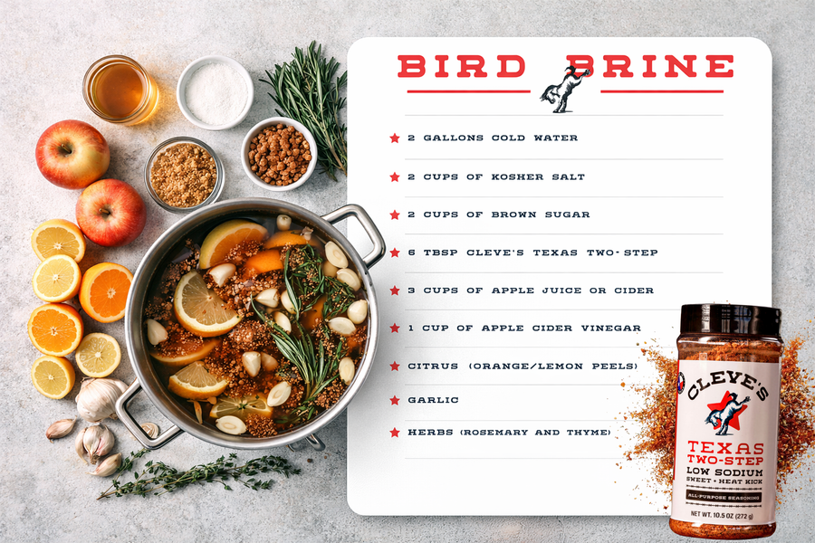 Stockpot of Cleve's Bird Brine with citrus, garlic, and rosemary, surrounded by apples, oranges, and brown sugar, beside a bottle of Texas Two-Step seasoning