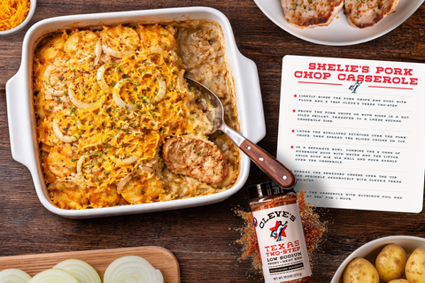 Dish of Cleve's Shelie's Pork Chop Casserole with potatoes, onions, and melted cheese, beside a bottle of Texas Two-Step seasoning