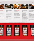 Cleve’s Gourmet Products Texas seasoning gift box with five low sodium seasoning bottles, recipe cards, and branded red packaging featuring Texas Heat, Gulf Coast, Texas Two-Step, Burger Booster, and Cowboy Charcoal.